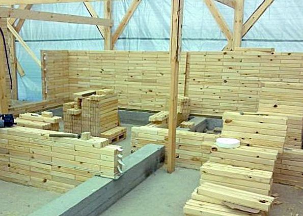 Кирпич из дерева (фото): состав и свойства, преимущества и недостатки, особенности строительства